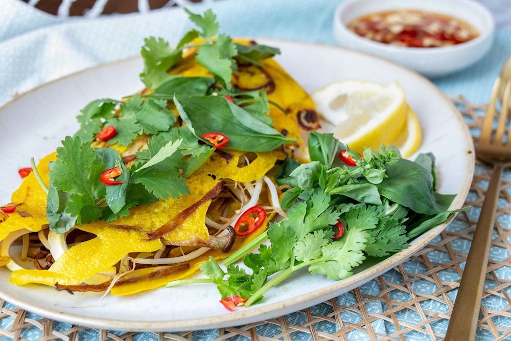 Vegan Banh Xeo with the perfect combination of fresh vegetables, shiitake mushrooms, and green beans creates an unforgettable flavor